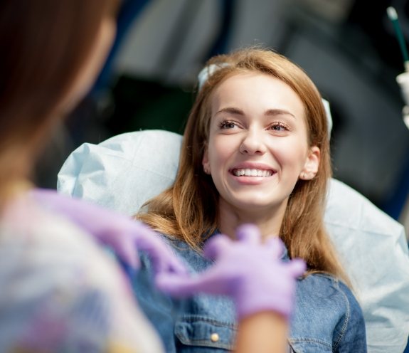woman smiling in dental chair